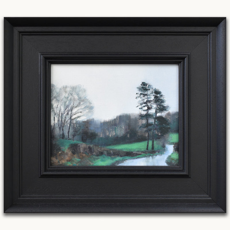 Small green landscape painting in oils with pine trees. Atmospheric art by UK artist Julia Brown. oil paintings for cosy spaces