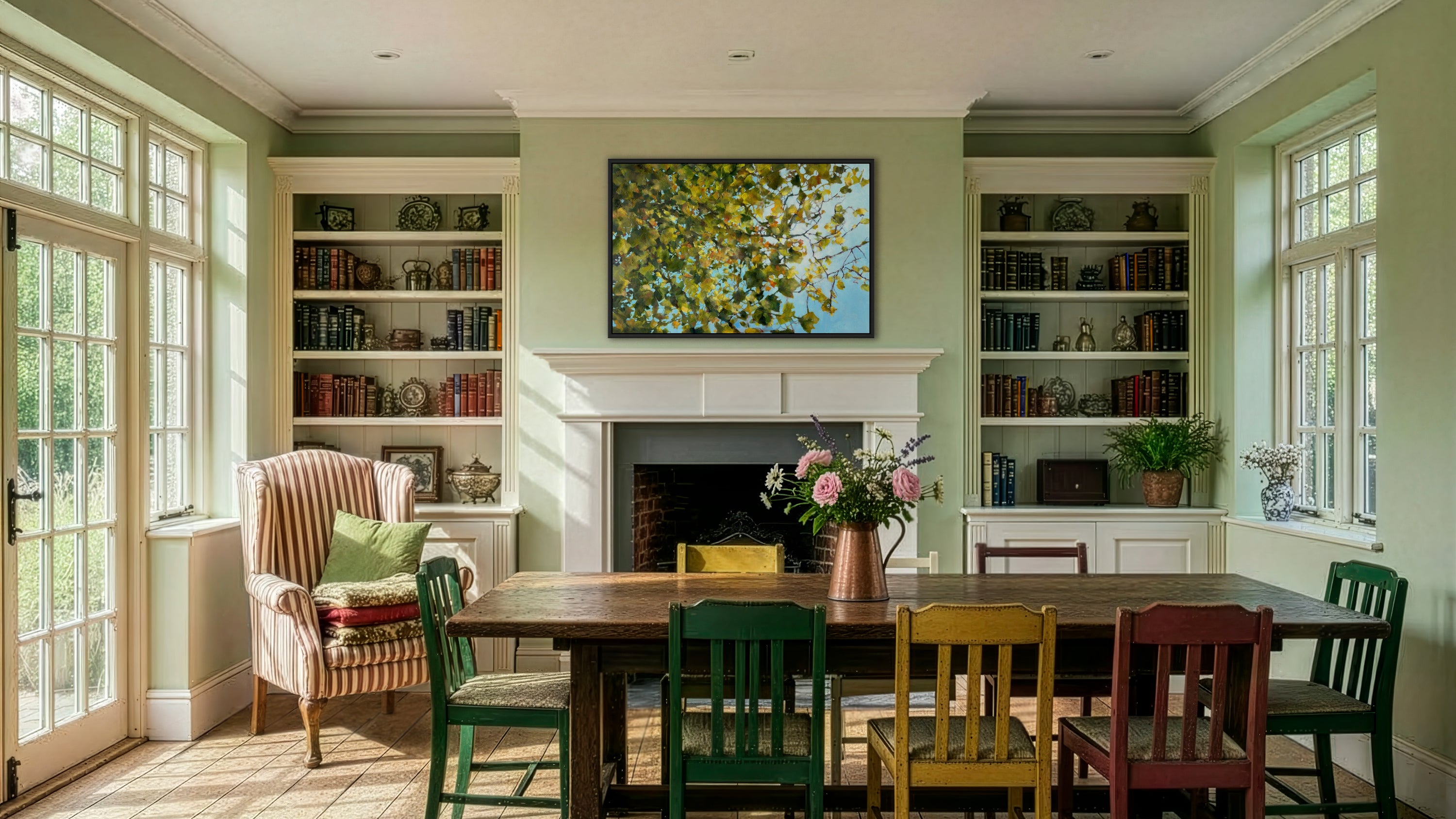 A calming abstract textured oil painting of golden green autumn leaves by Julia Brown in an eclectic period dining room