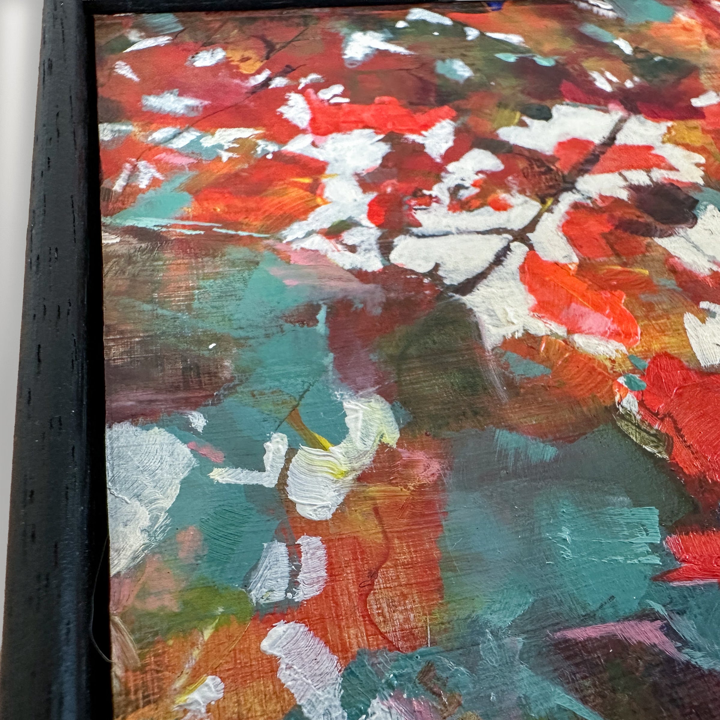 Warm, textured artwork surface of rustling maple leaves and broken light, evoking calm and stillness