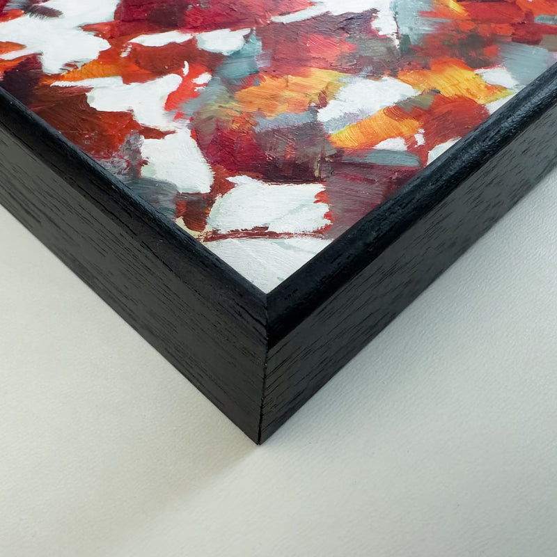 A close-up image showing a black wood frame and surface detail from Escape from the Grey oil painting by Julia Brown